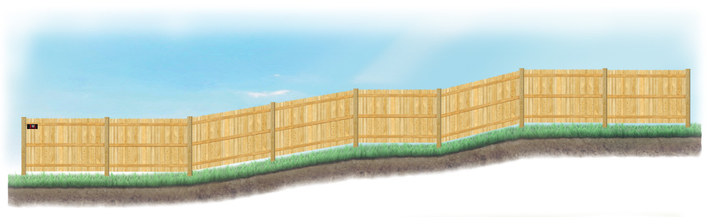 A stepped fence on sloped ground in Wyoming